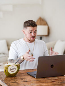 Lewis Raymond Taylor attending a meeting on a laptop